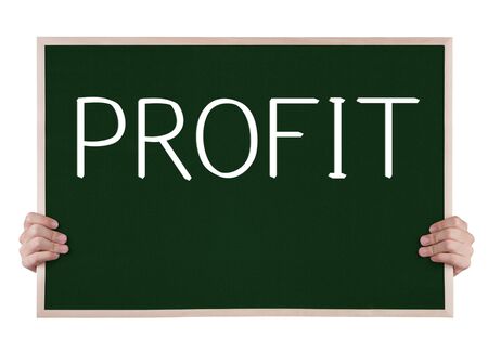 profit on blackboard with handsの写真素材