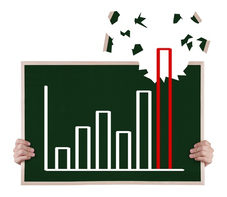 over achievement  growth graph on blackboard with handsの写真素材
