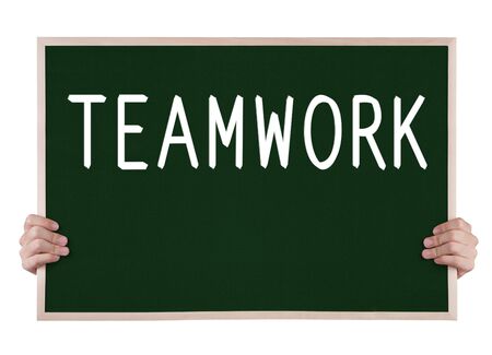 teamwork  on blackboard with handsの写真素材