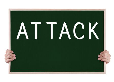 attack  on blackboard with handsの写真素材