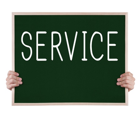 service on blackboard with handsの写真素材