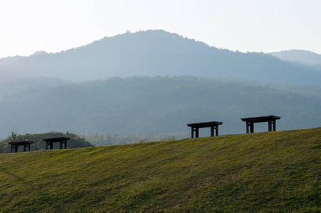 Bench on top of the mountain view backgroundの写真素材
