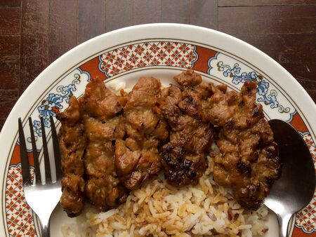 rice with grill pork and cooked with soy bean source ready to serveの写真素材