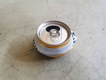 destroy can for reduce space to put in garbageの写真素材