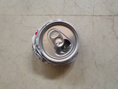 destroy can for reduce space to put in garbageの写真素材