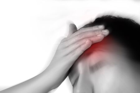 women has inflammation and swelling cause a pain the headache, isolated on white background.の写真素材