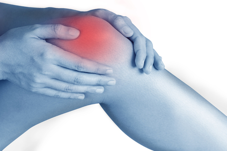 women has inflammation and swelling cause a pain the sore knee, isolated on white background.の写真素材