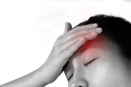 women has inflammation and swelling cause a pain the headache, isolated on white background.の写真素材