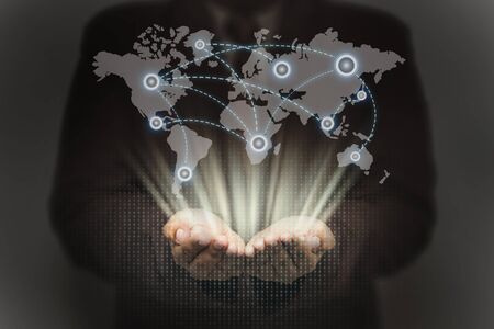 Businessman on blurred background working together and technology theme drawing hologram. Big data concept. Computer background.の写真素材