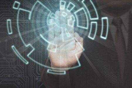 Businessman on blurred background working together and technology theme drawing hologram. Big data concept. Computer background.の写真素材