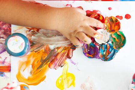 Children playing with watercolor stay at home. little boy and water colors.の写真素材
