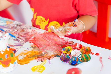 Children playing with watercolor stay at home. little boy and water colors.の写真素材