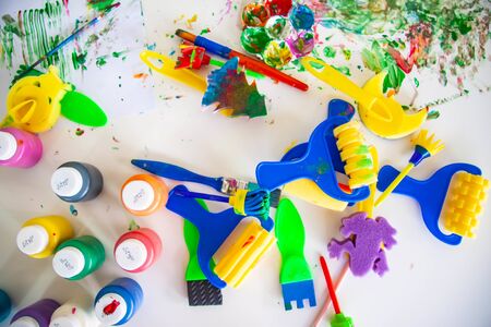 Children playing with watercolor stay at home. little boy and water colors.の写真素材