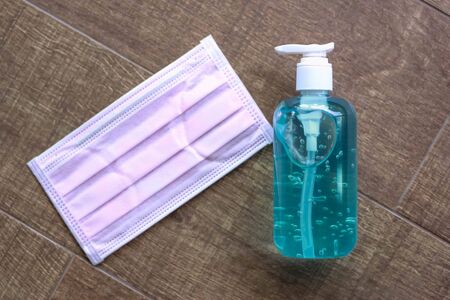 Washing hands with alcohol gel. Sanitizer after using a public restroom. Hygiene concept. Prevent the spread of germs and hand hygiene corona virus protection.の写真素材