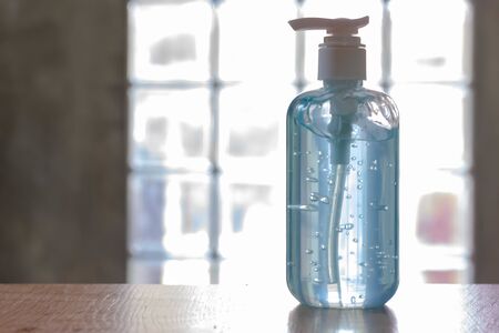 Washing hands with alcohol gel. Sanitizer after using a public restroom. Hygiene concept. Prevent the spread of germs and hand hygiene corona virus protection.の写真素材