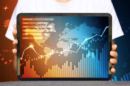 Close-up Of Business man's hand holding tablet showing stock market statistics gain profits and...