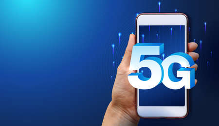 Hand of woman or man holding smartphone use 5G network wireless systems and internet of things with man touching with wireless high-speed Internet communication network background.の写真素材