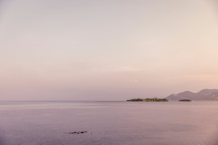 Relaxing seascape with the sky and the sea of blue and mini island.の写真素材