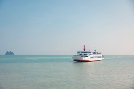 Ferry boat in Thailand linking Suratthani to Kho Samui passing by on Gulf of Thailand sea.