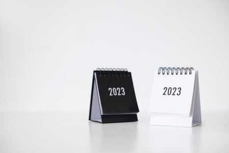 2023 business calendar on office table in new year day. Make a work plan for the start of the year. Concept about Celebration, Business, Christmas, New Year.の写真素材