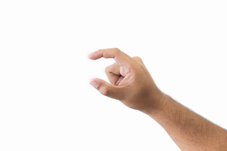 Close-up man's hand holding something. Open outstretched hand, showing five fingers, extended in greeting copy space isolated on white background. Space for text.の写真素材