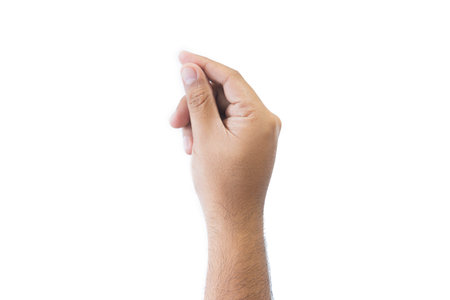 Close-up man's hand holding something like a blank card. Open outstretched hand, showing five fingers, extended in greeting copy space isolated on white background. Space for text.の写真素材
