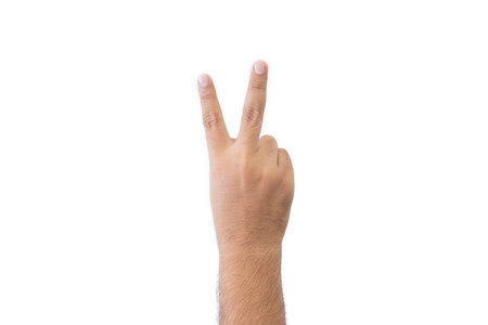 Close-up man's back of hand. Open outstretched hand, showing two fingers means number two, extended in greeting copy space isolated on white background. Space for text.の写真素材
