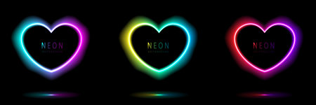 Set of neon light heart shape frames design on a dark background. gradient glowing borders. elements valentine day festival design. colorful futuristic Valentines Day. vector design.のイラスト素材