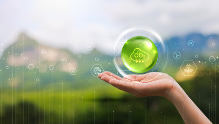 Hand holding with icons of reducing CO2 emissions, ESG, net zero. energy saving concept. save our planet, world environment day, world earth day. sustainable development and green business.の写真素材