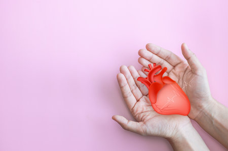 Hands holding plus health care and medical icon, health and access to welfare health concept. technology background,health insurance business.Health Insurance, telemedicine.の写真素材