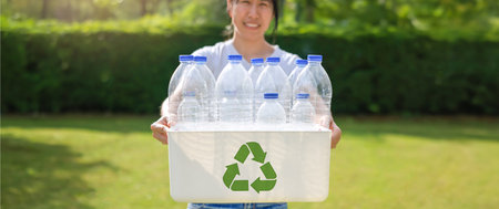 Plastic bottle for separating recycle materials from the garbages. Recycling in environmental sustainability and reducing carbon emissions, protect the environment, reducing waste, recycling materialsの写真素材