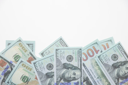 close up fiat money 100 usd banknotes on a white background. Pile of United States of America Finance. concepts of banking,cash, savings,fiat money concept,100 dollars. Money Mockup.の写真素材