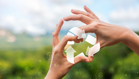 Global recycling day in environmental sustainability, recycling symbol, bins, plastic bottles and...