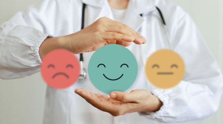 Medical concepts. doctor holding paper cut circle symbol face smile, happy, relax, satisfaction survey, positive, good, wellness, health child, hospital, world mental health day concept.の写真素材