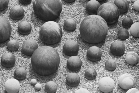 Round stone on pebbles rockの写真素材