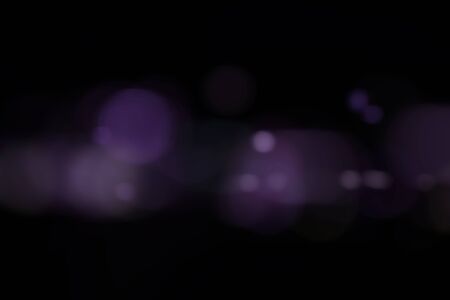 Abstract blur colorful  with bokhes on black backgroundの写真素材