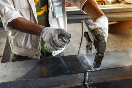 Checking defect in welded with process Magnetic Particle Testing(MT) of Non-Destructive Testing(NDT) at industrial factory.の写真素材