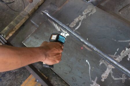 Measure interpass temperature on heat affected zone (HAZ) with Infrared Thermometer in process pre-qualification record(PQR).の写真素材