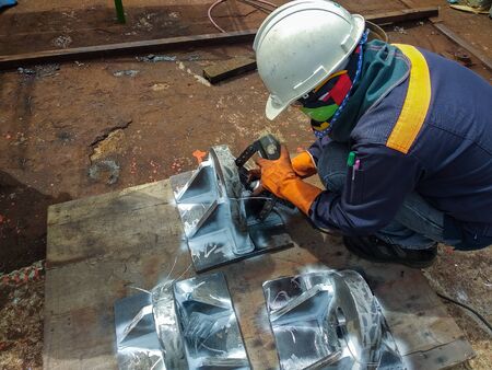 Checking defect in welded with process Magnetic Particle Testing(MT) of Non-Destructive Testing(NDT) at industrial factory.の写真素材