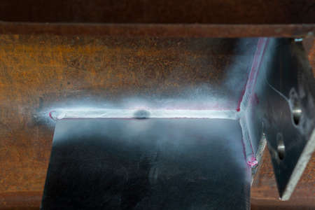 After use Developer spray into the welded to pull the liquid penetrate from the defect for...
