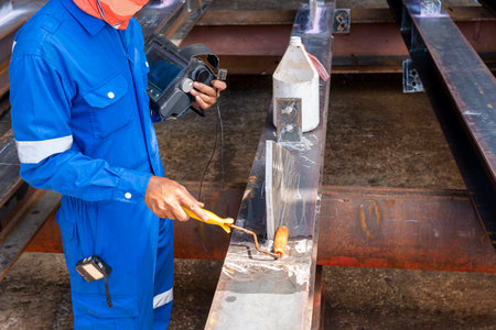 Inspectors are prepared the surface before testing with the process Ultrasonic testing (UT) of...
