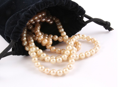 pearl necklace in black bagの写真素材