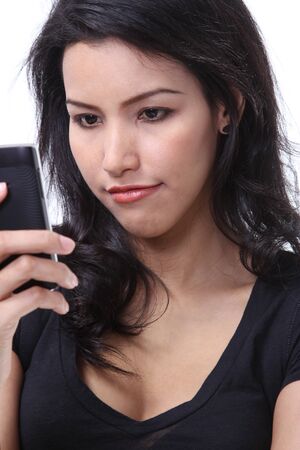 Image of business woman use her mobile phone on white backgroundの写真素材