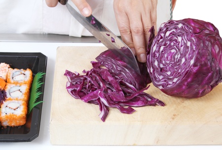 Closeup image of hand cutting vegetables for sushi japanese foodの写真素材