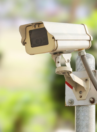 Closeup image of CCTV security camera at garden outdoorの写真素材