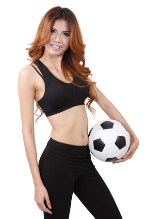 Image of woman holding a football on her hand and white backgroundの写真素材