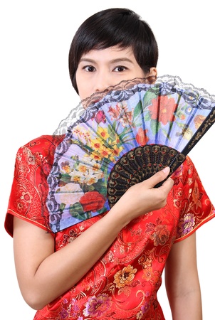 Image of chinese woman hold fan in her hand and happy chinese new yearの写真素材