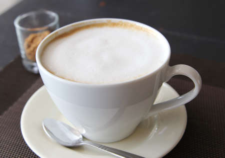 closeup image of hot coffee and white cup for breakfast in the morningの写真素材