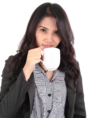 Image of asian business woman drinking coffee on white backgroundの写真素材
