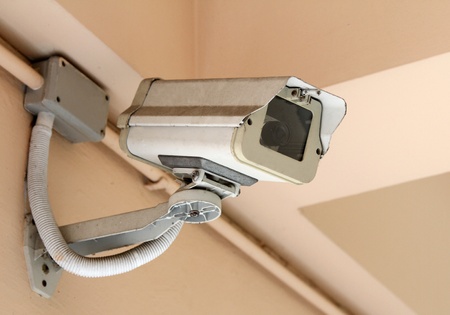 images of old CCTV security camera on the wallの写真素材